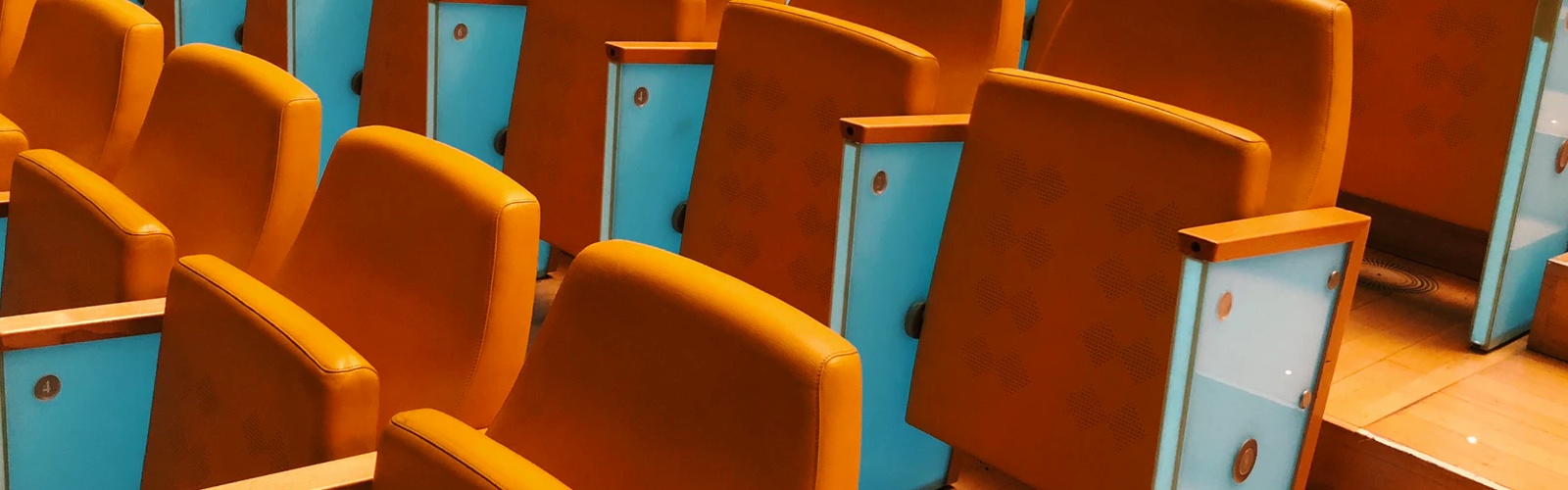 Rows of colourful yellow chairs